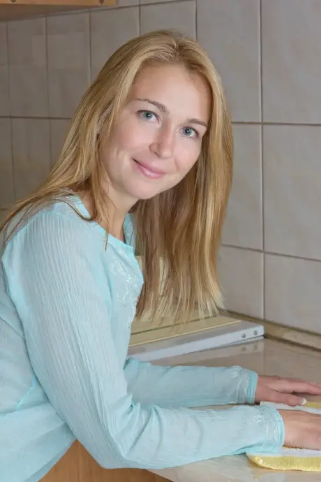 Natalia Grand opens wide and fingers her hairy pussy in a close-up shot