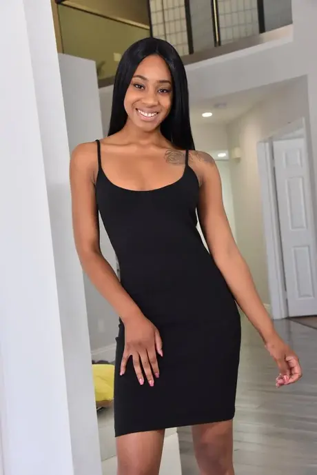 Black teen Lala Ivey spreads her tight pink pussy lips with her fingers