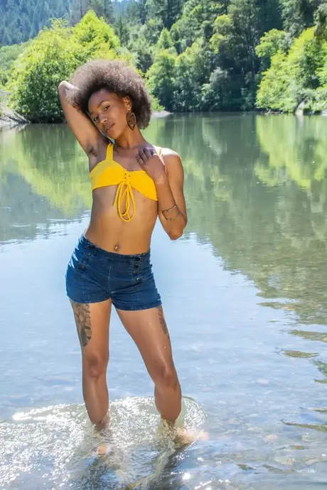 Nikki Darling Shows Off Her Hairy, Inked Body by the River