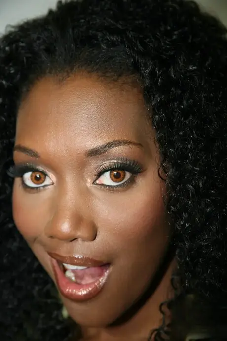 Nyomi Banxxx blows a big cock and takes a facial through a gloryhole