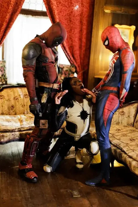 Ana Foxxx performs oral on two superheroes in a threesome