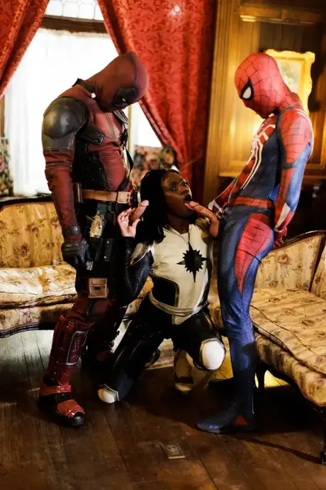 Ana Foxxx performs oral on two superheroes in a threesome