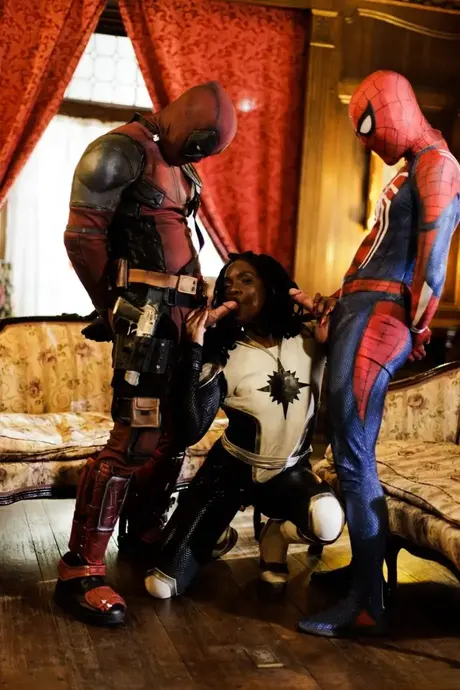 Ana Foxxx performs oral on two superheroes in a threesome