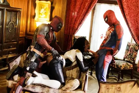 Ana Foxxx performs oral on two superheroes in a threesome