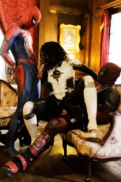 Ana Foxxx performs oral on two superheroes in a threesome