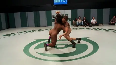 Naked Female Wrestlers Compete in the Ring