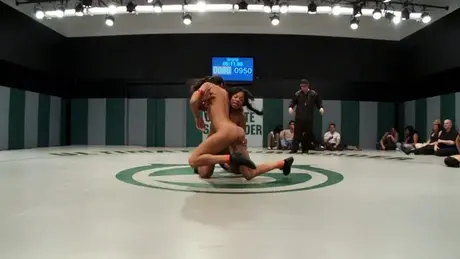 Naked Female Wrestlers Compete in the Ring