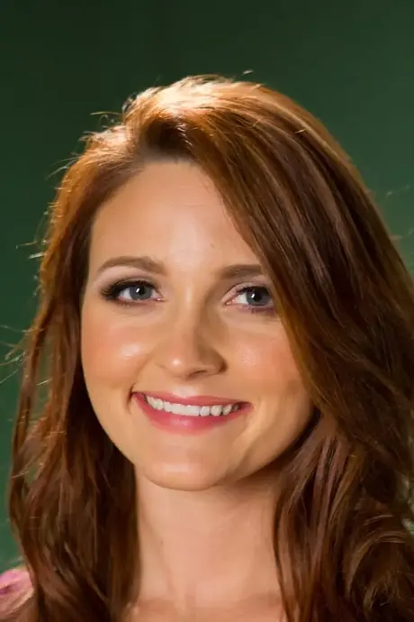 La rousse Kenzie Vaughn se déshabille entièrement en talons avec une touche inconvenante