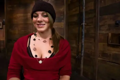 Kirra Lynne, the brunette slave girl, is bound, ball-gagged and dominated